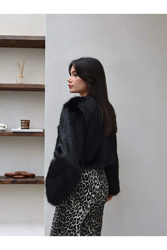 סוודר מֵלִירָה